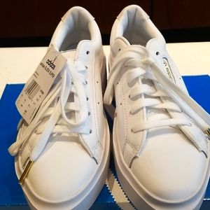Adidas sleek super footwear white sports shoes